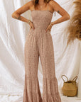 PENELOPE - Floraler Spaghettiträger-Smocking-Jumpsuit mit weitem Bein